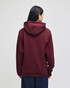 A burgundy hooded sweatshirt with a relaxed fit, featuring a hood and long sleeves, viewed from the back.