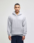 A grey pullover hooded sweatshirt with a front pocket, featuring a logo on the sleeve.