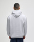 A grey pullover hooded sweatshirt with a relaxed fit, featuring a large hood and long sleeves, viewed from the back.