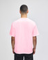 A pink Champion adult heritage jersey t-shirt displayed from the back view on a male model.