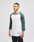 A model wearing a Champion Adult Raglan Baseball T-Shirt, featuring a white body and green sleeves. The shirt has a logo.