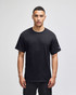 A black short-sleeve t-shirt with a logo on the sleeve, displayed on a model against a plain background.