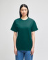 A green Champion Adult Short-Sleeve T-Shirt displayed on a model, featuring a logo on the sleeve.