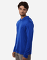 A men's hooded performance t-shirt in bright blue, featuring long sleeves and a fitted look. It has a logo on the chest.