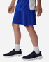 Men's Pro-Lock Performance Shorts in blue, featuring a loose fit and detailed design, paired with black athletic shoes.