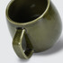 A green ceramic coffee mug with a unique handle design, featuring a glossy finish. Set of two available.