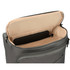 A grey wheeled duffle bag with an open top revealing a tan interior and a black item inside. It has a logo.