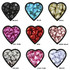 A selection of chocolate hearts in various colours: black, blue, gold, hot pink, red, rose gold, silver, light pink, and white, all in heart-shaped containers.