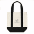 A mini canvas tote in cream and black with handles and a logo on the front.