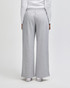 Grey women's wide leg pants with an elastic waistband, featuring a logo on the back.
