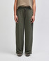 Wide leg pants in olive green with a drawstring waistband, featuring a relaxed fit and a logo on the waistband.