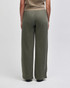 Wide leg pants in olive green, featuring a comfortable elastic waistband. The design is simple and relaxed.