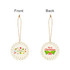 A ceramic ornament featuring festive designs in red, green, and assorted holiday motifs on both sides. Gold hanging string included.