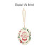 A ceramic ornament in white with festive decorations, featuring a Christmas and New Year greeting, and a gold hanging string.