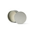 A mini tin candle in a silver container, featuring a white wax interior and a visible wick.