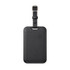 A black luggage tag tracker with a looped strap and a minimalist design, featuring a small logo on the front.