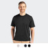 A man is wearing a black Cutter & Buck Coastline Epic Comfort Tee, featuring a logo on the shirt.