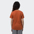 An orange women's T-shirt viewed from the back, featuring a simple design and short sleeves.