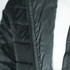 A black puffer jacket featuring a zippered front and quilted design, with a visible logo on the fabric.