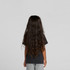 A black kids' heavy faded tee displayed on a child with long, curly hair, facing away from the camera.