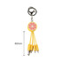 A yellow custom-shaped PVC charging cable with a keyring and a sliced fruit design, featuring three connectors.
