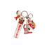 A custom-shaped PVC keyring featuring a colourful lion design with red and white accents, along with a fish charm.
