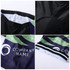 Men's sublimated cycling shorts in black with green and purple design, featuring a logo. Includes elastic waistband detail.