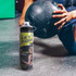 A drink bottle featuring a double wall design in black and green, with a logo and a sports-themed graphic.