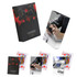 A set of custom playing cards in a black box featuring red and black designs, including a logo and playing card images.