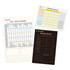 A magnetic calendar planner set featuring a yearly, monthly, and weekly planner in various pastel colours and a black background.