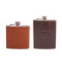 A drink bottle set featuring two classic hip flasks with brown leather exteriors and silver metal tops, one embossed with a logo.