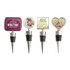 A set of four wine stoppers featuring various designs and colours, with metallic and rubber elements.