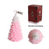 Cedar Christmas tree shape candles in pink with a white top, packaged in festive Christmas-themed boxes.