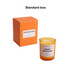 A 3.5oz glass candle in an orange box, featuring a white label and a warm yellow-orange candle.
