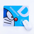 A blue mouse mat featuring a cartoon character and a white computer mouse on a white background.
