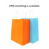 Two paper bags with twisted handles, one in orange and the other in blue, featuring logos.