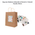 A medium-sized brown kraft paper bag with twisted handles, accompanied by decorative stickers.