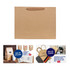 A large brown paper bag with a fabric flat handle, featuring a logo, and notable for its simple design.