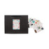 A large black paper bag with a fabric handle, accompanied by various decorative stickers.