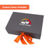 A grey foldable magnetic box featuring an orange ribbon and a logo on the top. Custom colour options are available.