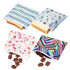 Four reusable food pouches with zipper closures, featuring various colourful patterns, holding snacks and bread.