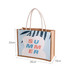 A jute and canvas tote bag in natural and light blue, featuring a summer-themed design and dimensions.