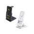 A black and a white charging station, featuring wireless charging pads and a logo, in a sleek design.