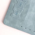 A light blue RFID multifunctional PU leather passport holder with slots for cards and SIM cards.