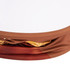 A backlit LED spring-up display with a rectangular shape, featuring a brown and orange fabric graphic.