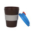 A small glossy coffee cup in brown with a blue lid and grey band. It features a logo.