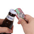 A drink bottle with a blue and white cap being opened by a red, green, and silver dog tag bottle opener keyring.