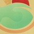 A textured mat featuring abstract shapes in green, yellow, and red, with a branding logo present.
