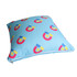 A square cushion featuring a light blue background with colourful magnet patterns. It has a zip closure and a logo.