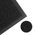 A black floor mat with a textured surface, featuring a close-up of its fibrous design and a logo.